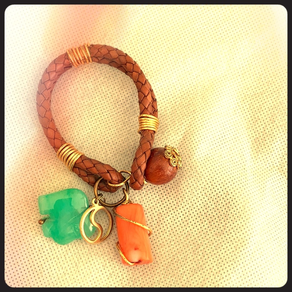 Leather rope bracelet with jade and coral hanging